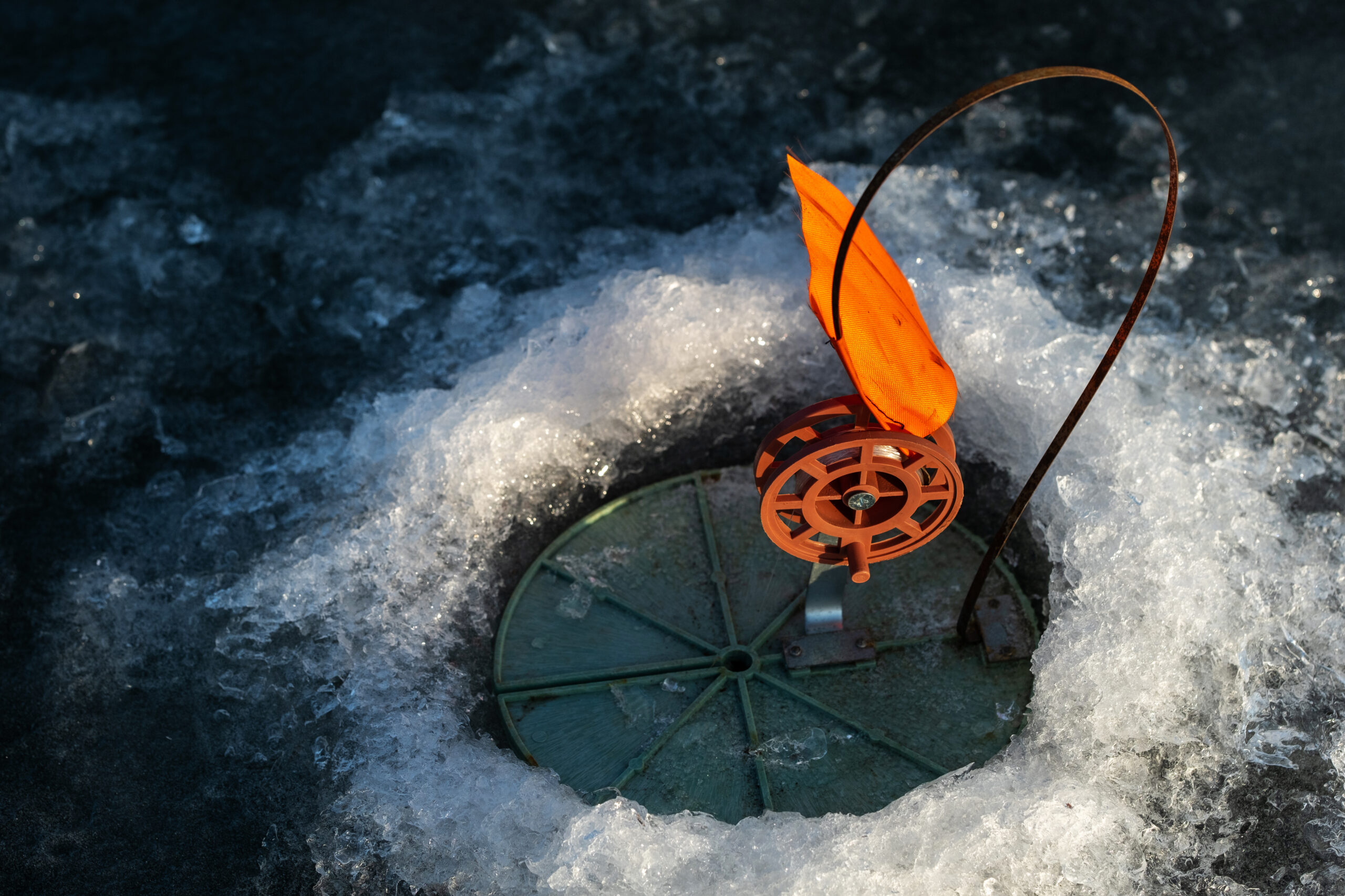 ice fishing tip up with orange flag in winter 2026 03 24 23 26 12 utc scaled